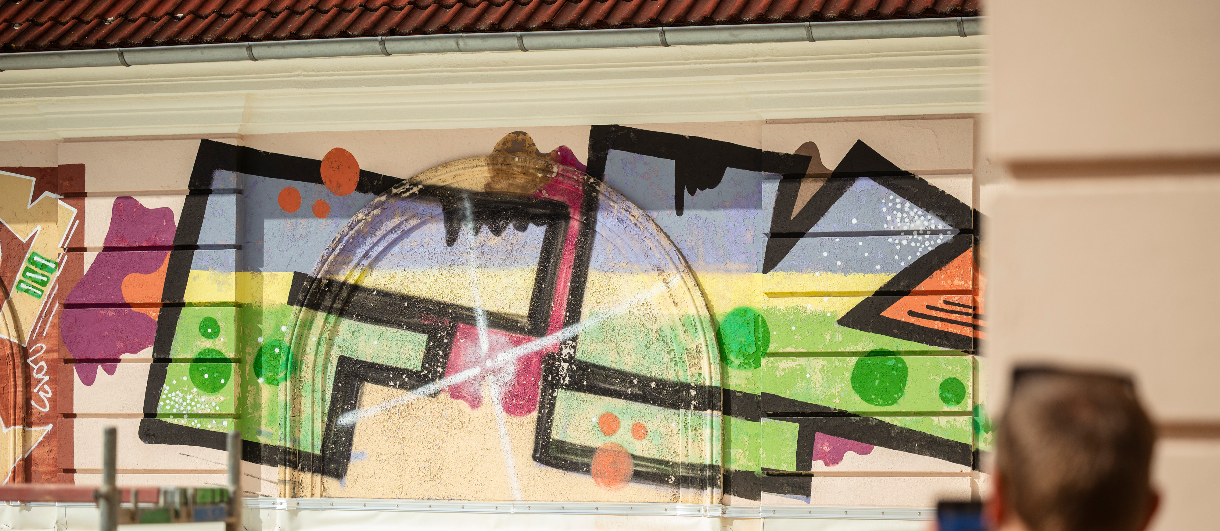 KulturQuartier betrachtet sein Graffiti